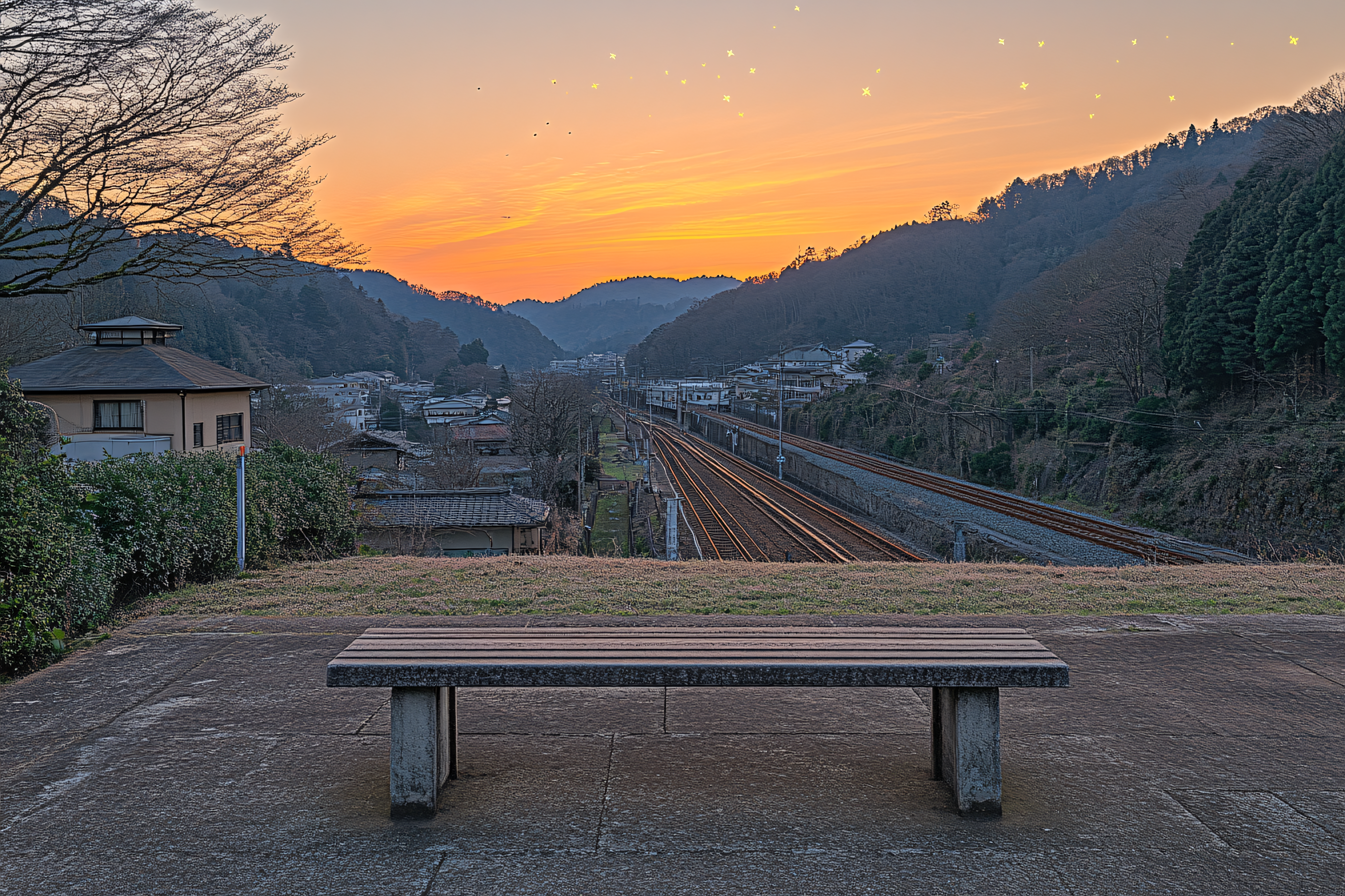 Bench Overlooking Train Tracks at Sunset