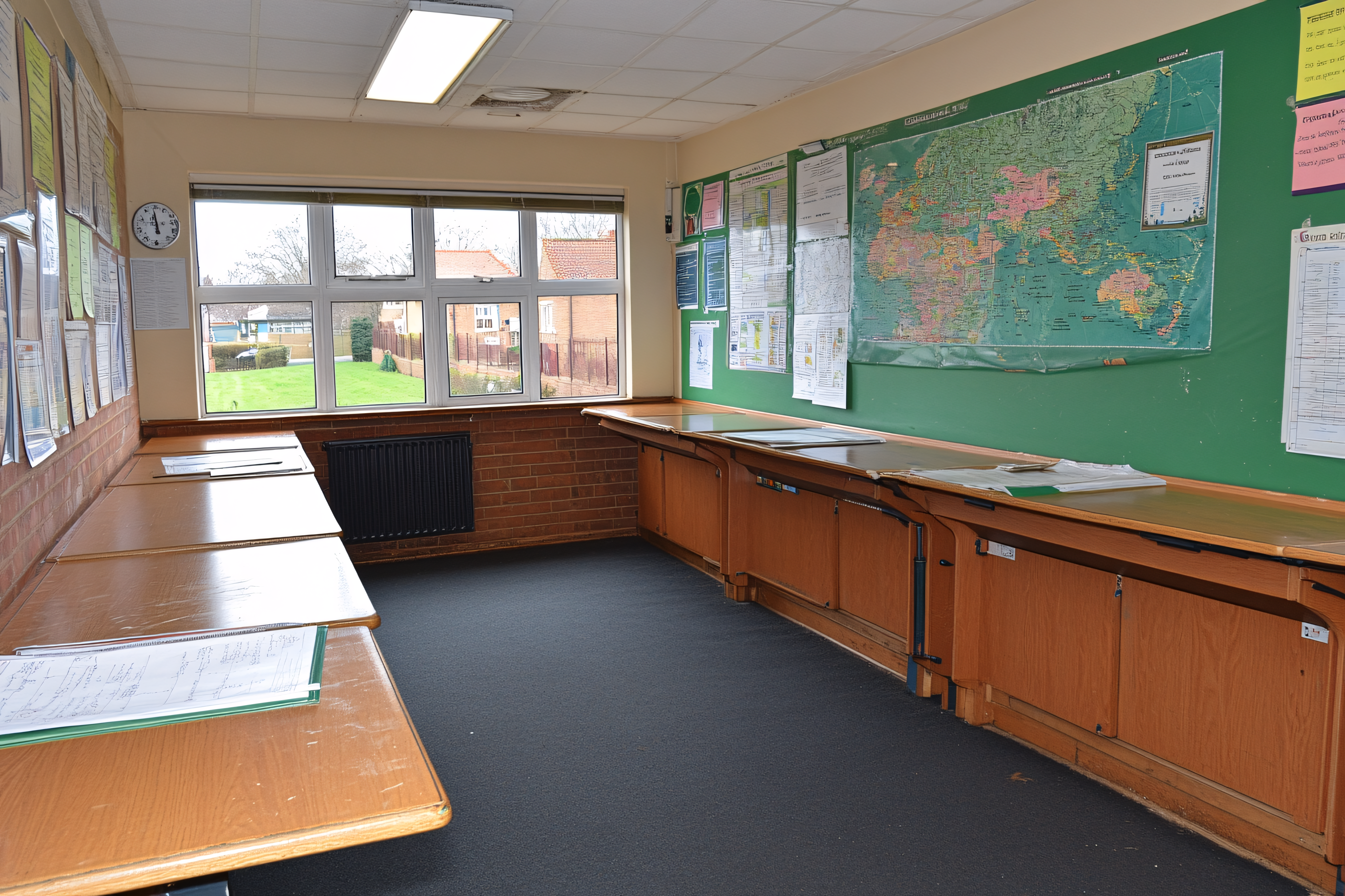 Classroom Interior with World Map and Wooden Desks