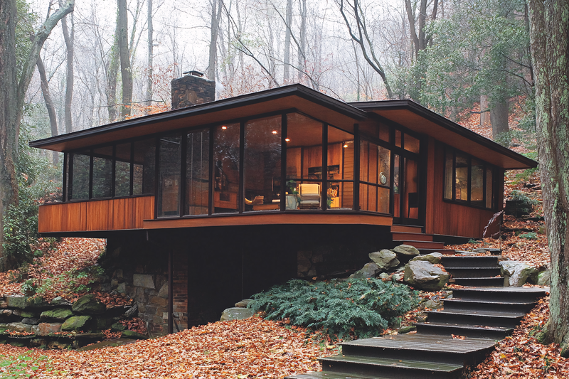 Modern Wood And Glass House In Autumn Woods
