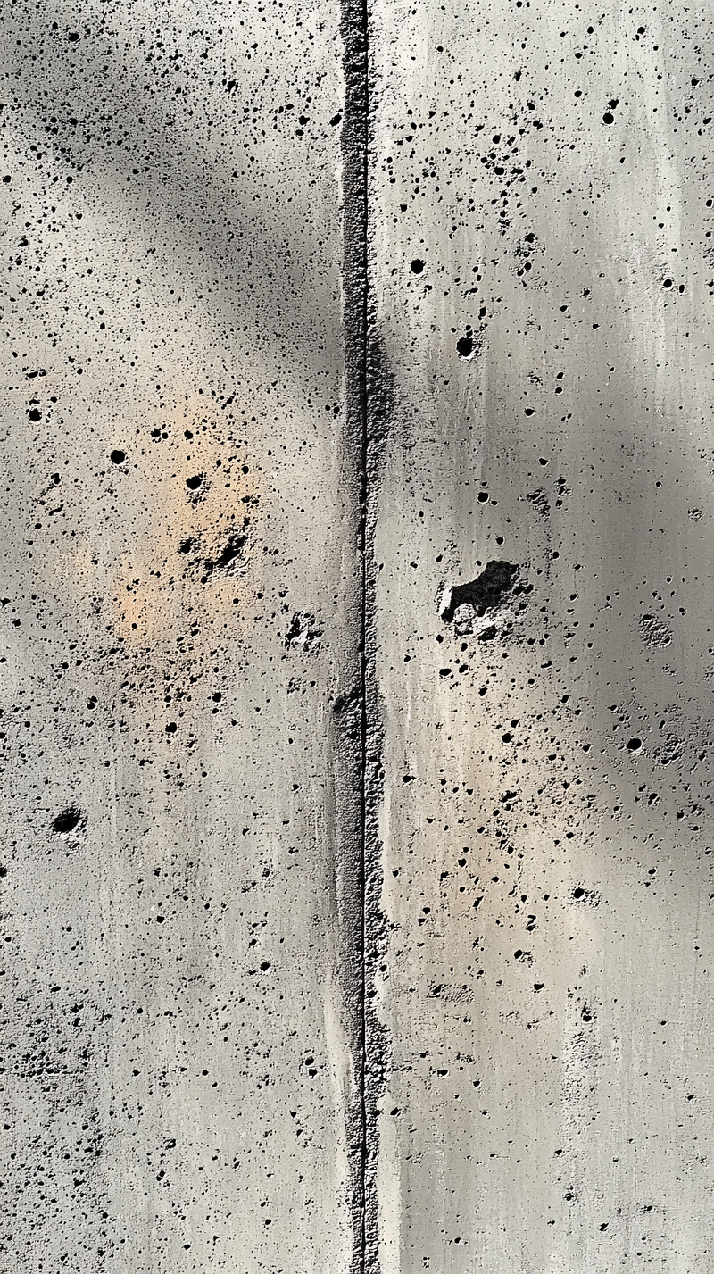Textured Concrete Wall With Vertical Seam
