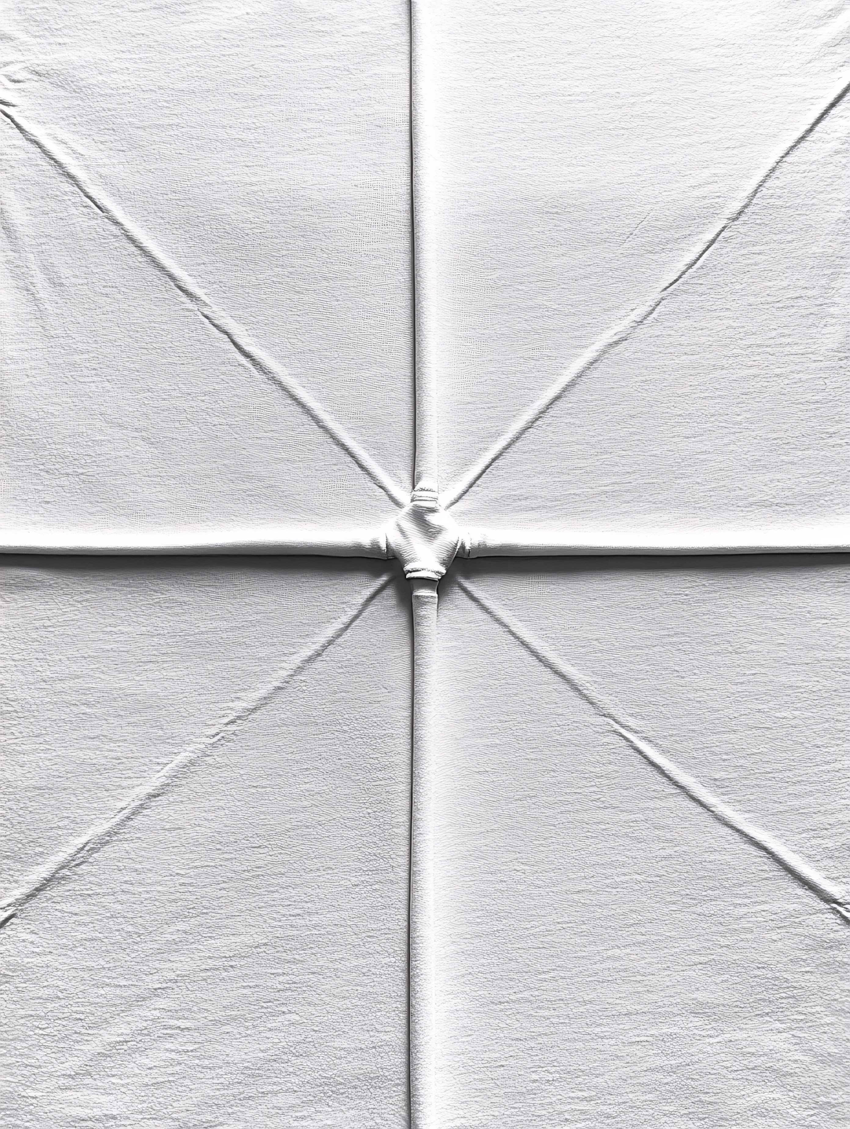 Wrinkled White Fabric Cross