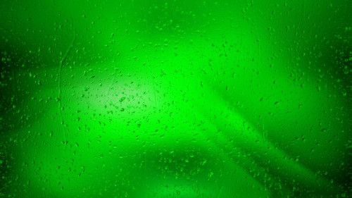 Water Drops on Neon Green Background